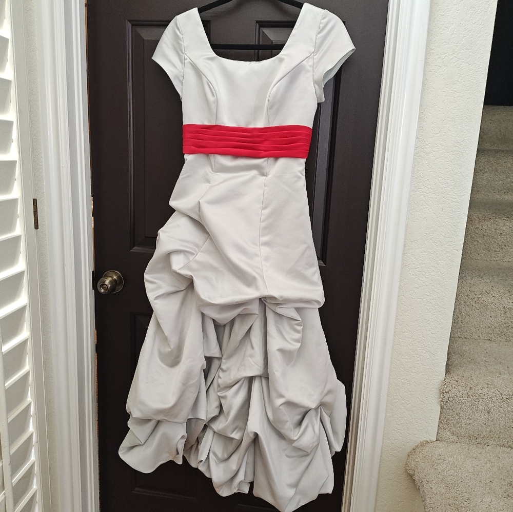 Elegant White Gown with Red Accent